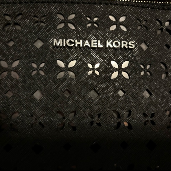 Michael Kors Women’s Floral Perforated Large Zip Clutch - Picture 3 of 13